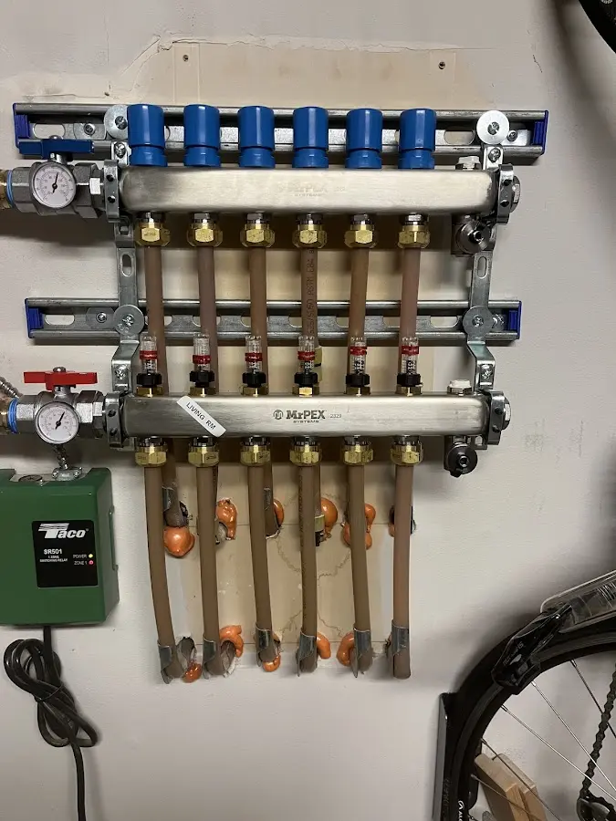 Plumber performing Water Heater Repair at a residential property in Franconia